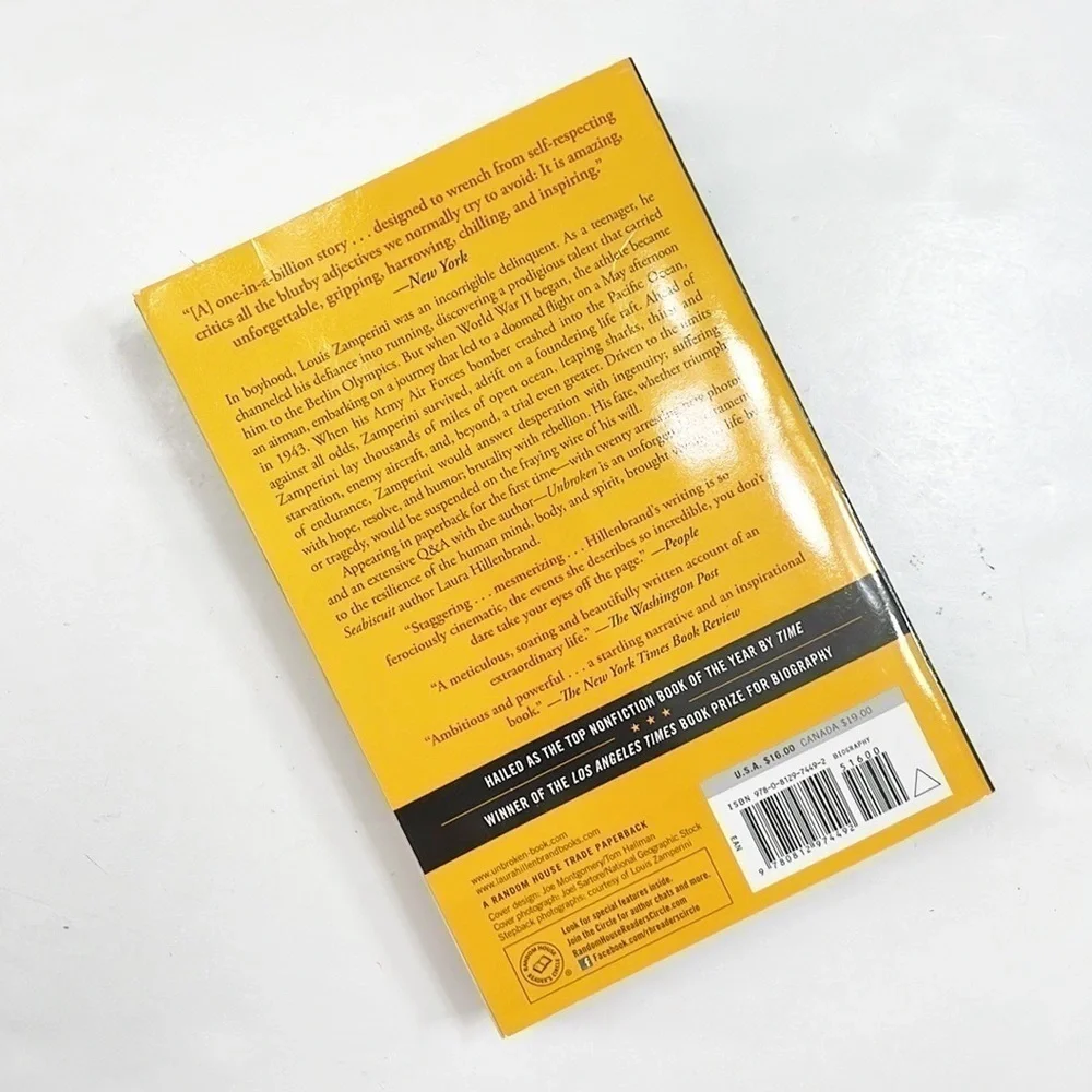 Unbroken Louis Zamperini by Laura Hillenbrand paperback book